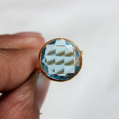 D E T A I L S - Material: Sterling silver 925 Stone: Blue Topaz Quartz (Lab Created) The fit: True to US ring size Finish: Smooth and Gold Plated to a high shine S H I P P I N G & P R O D U C T I O N - My current production time is 2-6 business days, which means after those days are up, your order ships! I make everything custom to order, by hand, but I promise you it's worth the wait! R U S H - M Y - O R D E R - If you're in a rush to get your pretty new pieces, please send me a message and Blue Faceted Sapphire Ring In Fine Jewelry Style, Gift Topaz Solitaire Ring, Topaz Crystal Ring With Round Cut For Gift, Gift Crystal Topaz Ring With Round Cut, Gift Round Cut Topaz Crystal Ring, Turquoise Topaz Ring, Blue Topaz Ring With Bezel Setting For Gift, Blue Topaz Ring With Vs Clarity For Gift, Blue Topaz Ring With Bezel Setting As Gift