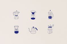 various types of coffee pots and kettles on a white surface with blue ink in the middle