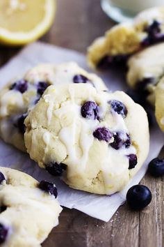 lemon blueberry cookies with icing on a table