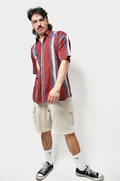 🚀Need to get your order super fast? Choose DHL Express shipping upgrade in your cart. It takes only 1-2 b. days to European Union countries and 2-5 b. days to USA, Canada and all other countries. Orders are ready to ship in 1 b. day. 🔥90s style striped cotton button up short sleeve shirt in red blue multi colour. Size - M. Model is 177 cm / 5ft 9.6" tall and usually wears size M. Very good condition. Only 1 available! All orders are shipped every day Worldwide from 🇪🇺EU. Safe registered stan Cotton Shirt With Vertical Stripes For Summer, Summer Cotton Shirt With Vertical Stripes, Cotton Summer Shirt With Vertical Stripes, Summer Collared Shirt With Vertical Stripes, Casual Short Sleeve Shirt With Vertical Stripes, Summer Shirt With Vertical Stripes And Relaxed Fit, Striped Short Sleeve Shirt With Pockets, Vertical Stripes Relaxed Fit Short Sleeve Shirt, Relaxed Fit Shirt With Vertical Stripes And Short Sleeves