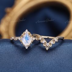 Jewelry Information: ♡ Handmade, high-quality item ♡ Material: SOLID 14K/18K GOLD ( can be made in yellow/white/rose gold ) ♡ Center stone: Moonstone ♡ Size/Weight: 8x6mm ♡ Cut - Pear Shaped ♡ Color: Blue ♡ Side stones: Moissanite/ Natural diamonds ♡ Weight: About 0.16ct ♡ Cut - Round Shaped ♡ Clarity - SI-VS ♡ Color- G-H ♡ Band Width: Around 1.6mm ♡ Wedding band ♡ Stone: Moissanite / Natural diamonds ♡ Weight: About 0.075ct ♡ Cut - Round Shaped ♡ Clarity - SI-VS ♡ Color- G-H ♡ Band Width: 1.6mm Crescent Moonstone Anniversary Ring, Crescent Moonstone Ring For Anniversary, Elegant Pear-shaped Moonstone Ring, Yellow Gold Moonstone Opal Anniversary Ring, Yellow Gold Opal Ring With Moonstone For Anniversary, Celestial Gold Moonstone Ring For Wedding, Teardrop Moonstone Wedding Ring In Fine Jewelry Style, Teardrop Moonstone Wedding Ring Fine Jewelry, Teardrop Moonstone Ring For Wedding