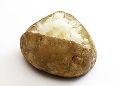 a close up of a baked potato on a white background