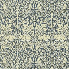 an intricate blue and white wallpaper design