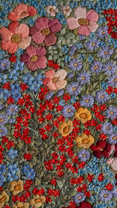 a close up view of a flowered table cloth