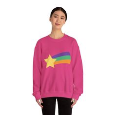 This Mable from Gravity Falls shooting star sweatshirt brings a touch of whimsical nostalgia to your wardrobe. Perfect for fans of the show and those who appreciate cozy comfort during the colder months. An ideal choice for casual wear or lounging at home, this sweatshirt blends style with functionality. Product features - Ribbed knit collar for elasticity and shape retention - Medium-heavy fabric blend for added warmth - Classic fit and crew neckline for a comfortable wearing experience - Doubl Mabel Pines Sweaters, Mabel Gravity Falls, Mabel Sweater, Star Sweatshirt, Mystery Shack, Gravity Falls Funny, Dipper Pines, Shooting Star, Shooting Stars