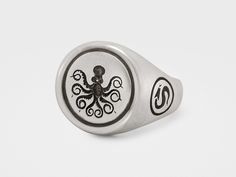 Octopus Signet Ring in Sterling Silver Symbolic Stamped Sterling Silver Signet Ring, Symbolic Sterling Silver Stamped Signet Ring, Symbolic Stamped Signet Ring In Sterling Silver, Silver Stamped Symbolic Signet Ring, Silver Symbolic Stamped Signet Ring, Symbolic Silver Ring With Intaglio Detail, Silver Symbolic Signet Ring With Engraving Option, Silver Intaglio Symbolic Ring, Symbolic Silver Intaglio Ring