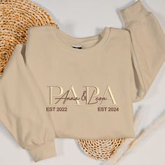 Celebrate Father's Day with our Custom Embroidered Father's Day Sweatshirt, personalized with the names of his two children. This heartfelt gift is the perfect way to show your appreciation and love for the best dad ever. Design: Our custom sweatshirt features beautifully embroidered names of his children, making it a unique and sentimental piece. The intricate embroidery adds a personal touch that highlights the special bond between a father and his kids. Material: Crafted from high-quality fab Embroidered Names, Gift For New Dad, Year Sweatshirt, Super Papa, Father Presents, Best Dad Gifts, Super Dad, Best Dad Ever, Gifts For New Dads