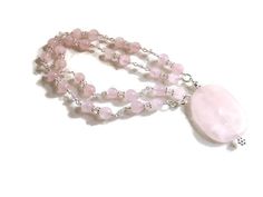 This pink necklace created by Jewelry By Carmal is made of  a pink rose quartz pendant, pink rose quartz gemstones, pink crystals, sterling silver: daisy spacers, spring ring clasp and findings. This necklace measures 17 inches in length and the pendant is 1 1/2 inches. View more chain necklaces:  http://www.etsy.com/shop/jewelrybycarmal?section_id=8001511 All of our jewelry arrives wrapped and ready for gift giving We offer free shipping via USPS within the United States Please see other items Pink Rose Quartz Crystal Necklace With Natural Stones, Feminine Pink Rose Quartz Jewelry, Pink Rose Quartz Gemstone Necklaces, Pink Rose Quartz Gemstone Necklace, Silver Rose Quartz Jewelry With Gemstone Beads, Silver Jewelry With Rose Quartz Gemstone Beads, Pink Rose Quartz Round Necklaces, Pink Rose Quartz Crystal Necklace, Valentine's Day Pink Rose Quartz Jewelry