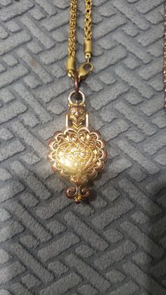 Vintage RARE goldette Victorian revival Gothic pendant locket necklace gold tone Heirloom Gold Brass Locket Necklace, Gold Heirloom Brass Locket Necklace, Gold Pendant Locket Necklace With Vintage Charm, Gold Locket Necklace With Vintage Charm, Gold-tone Brass Locket Necklace, Gold Medallion Locket Necklace With Lobster Clasp, Gold Brass Locket Necklace, Gold Locket Necklace In Brass, Antique Gold Medallion Necklace With Vintage Charm