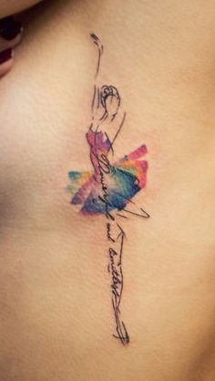 a woman's stomach with a watercolor ballerina tattoo on it