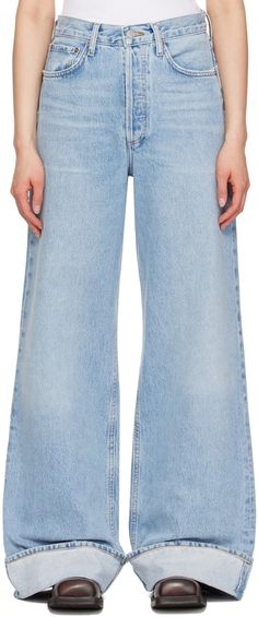 Find AGOLDE Blue Dame Jeans on Editorialist. Relaxed-fit wide-leg heavyweight non-stretch regenerative cotton denim jeans. Fading and whiskering throughout. · High-rise · Belt loops · Five-pocket styling · Button-fly · Rolled cuffs · Logo-engraved silver-tone hardware · Contrast stitching in tan Supplier color: Showdown Silver Engraving, Contrast Stitch, Apparel Accessories, Denim Jeans, Silver Tone, Wide Leg, High Rise, Stitching, Relaxed Fit