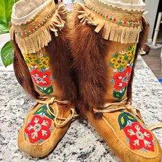 Moose Hide Alaskan Hand Beaded Mukluks. Vibrant Flowers Adorn The Front. Adorned With Hand Insulated Insoles. Sides Are Adorned With Beaver Fur. Hand Beaded Trim. Worn Once For An Athabaskin Wedding. Traditional Hand Beading Mukluk Boots, Native American Moccasins, Moccasin Pattern, Beaded Moccasins, Beadwork Designs, Native American Crafts, Native Beadwork, Beautiful Beadwork, Native American Beadwork