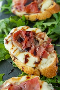 small appetizers with meat and cheese on bread