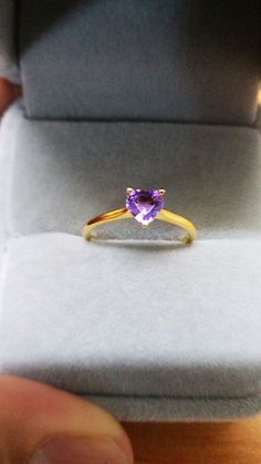 Amethyst Crystal 10k Gold Ring, Gemstone Purple Ring, Heart Ring 5mm Heart Cut, Amethyst Jewelry for Healing, Meditation Ring, Birthstone Ring, February Birthstone, Gifts for Her * Material: Amethyst gemstone, 10k real gold (It is not gold-filled or gold plated). * Made to order * Stone shape: Heart * Main stone: 1 natural Amethyst stone **Please be aware these are natural gemstones and coloring may vary** 💜 Amethyst is the birthstone for February, so if you're shopping for a February birthday Yellow Gold Amethyst Heart Cut Jewelry, Heart Cut Amethyst Birthstone Ring Fine Jewelry, Fine Jewelry Amethyst Heart Cut Birthstone Ring, Valentine's Day Heart Cut Amethyst Ring, Heart Cut Birthstone Ring In 14k Gold, Heart Shaped Amethyst Ring With Center Stone As Gift, Heart-shaped Amethyst Ring With Center Stone As A Gift, Heart-shaped Amethyst Ring With Center Stone For Gift, Heart Cut Ring