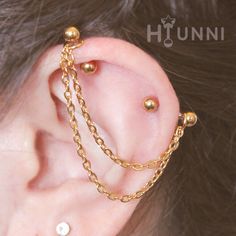 16g 14g Double Chain industrial piercing earring, Cartilages chain 2 ear studs, 316l surgical steel,1&1/2″(38mm), HiUnni Handmade Model is shown wearing 16g 6X8mm bars _ [ Chain Color Options ] Silver, Gold, Rose Gold _ [ Bar, Ball Options] Bar thickness: 16gauge, 14gauge _ One Bar length: 1&1/2″(38mm) 2Bars Bar lengths: 1/4″(6mm), 5/16″(8mm), 3/8″(10mm),1/2″(12mm) _ [ Materials ] Chain, Jump-rings: Ion gold plated 304 stainless steel Barbell: 316l surgical steel _ [ Measurement ]  – Chain thick Chain Industrial Piercing, Cute Industrial Piercing, Chain Industrial, Cartilage Chain, Industrial Bar Piercing, Double Helix Piercing, Industrial Ring, Ear Piercings Industrial, Industrial Earrings