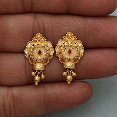 Discover the allure of Handmade Gold Jewelry at https://morvijewels.etsy.com/   Get a dazzling 25% off on all our 22k and 18k gold pieces. Don't miss out on this limited-time offer. Shop now and embrace the radiance of gold! Beautiful yellow gold earrings  Gold Purity- 22k yellow Gold Max Length - 2.6 cm approx Max Width - 1.5 cm approx Weight - 4.2 grams approx The earrings comes with normal push/backs but If you want real gold screw please let us know. Click here  https://morvijewels.etsy.com/    to get more discount and offers Happy to take wholesale bulk orders. Festive 22k Yellow Gold Bridal Earrings, 22k Gold Meenakari Jewelry For Puja, 22k Gold Chandbali Jewelry For Puja, 22k Gold Chandbali For Puja, Yellow Gold Chandbali Jewelry For Puja, 22k Gold Tilla Jewelry For Puja, 22k Gold Bollywood Jewelry With Latkans, 22k Yellow Gold Jewelry For Diwali, 22k Gold Jewelry For Puja