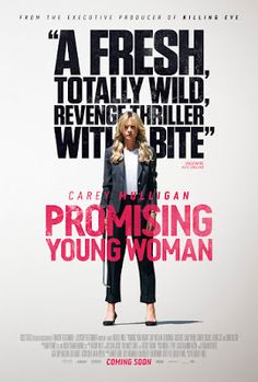 a woman standing in front of a poster for the movie, proming young woman