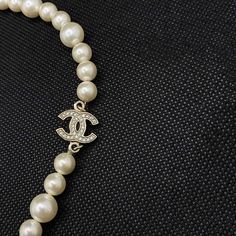 Description: Pre-Owned Chanel White Pearl Short Necklace Condition: Pre/Loved in Good Condition. Missing 3 Crystal Studs from the Logo. Estimated Retail: $2,250 Measurement: Diameter 15cm Details: White Faux Pearls2 CC Logos Embroidered by Crystal CutsLobster Clasp Closure For more details on this item, contact us on bagsarenaon@gmail.com Fits Ideas, Chanel White, Ysl Shoes, Jimmy Choo Sunglasses, Gold Ounce, Trending Handbag, Dior Shoes, Hermes Bags, Prada Shoes