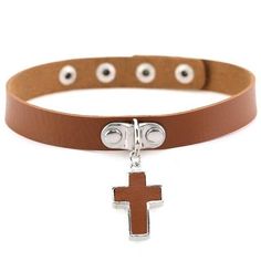 The beautiful yet simple gothic black cross choker is sure to display your beliefs in a fashionable and pretty way. Despite the title, this accessory comes in many different colors; black, red, green, silver, blue, brown, purple, pink, white, sky blue, rose red, yellow, and navy. Because of this, you have no worries in deciding which color you should leave behind! Innovato Design focuses on the latest trends to ensure you are updated on the fashionable circle.  Product Highlights:    Choker style cross pendant  Wide variety of colors  Simple design  Zinc alloy material Adjustable Gothic Cross Pendant Jewelry, Adjustable Punk Style Cross Jewelry, Punk Style Brown Jewelry For Gift, Adjustable Clavicle Chain Cross Necklace, Adjustable Cross Choker For Gifts, Trendy Adjustable Cross Jewelry, Trendy Brown Choker Jewelry, Gift Cross Choker, Cross-shaped Metal Choker For Gifts