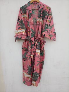 This Robe we makes from 100% Cotton printed fabric. The fabric print is Anokhi Floral which is very popular in all over the world . We use pure cotton cambric fabric . This is free One size robe . There is both side pocket in robe. Length = 120 cms. ( 48 inches) Printed Pink Sleepwear For Home, Pink Printed Sleepwear For Home, Red Printed Cotton Sleepwear, Pink Summer Robe For Bedtime, Summer Pink Robe For Bedtime, Printed Cotton Robe For Home, Pink Cotton Sleep Robe, Printed Summer Robe For Home, Summer Printed Robe For Home