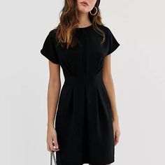 Asos Design Nipped-In Waist Midi Dress In Black. New With Tags! 96% Polyester, 4% Elastane Original Asos Listing: Https://Www.Asos.Com/Us/Asos-Design/Asos-Design-Nipped-In-Waist-Mini-Dress-In-Black/Prd/202856239?Ctaref=More+Colours+Swatches&Featureref1=More+Colours+Swatches Shift Mini Dress For Work, Solid Shift Mini Dress For Work, Black Short Sleeve Mini Dress For Office, Black Mini Dress With Short Sleeves For Office, Black Short Sleeve Office Dress, Black Mini Dress For Office In Summer, Black Pleated Mini Dress With Short Sleeves, Black Shift Mini Dress With Short Sleeves, Black Pleated Midi Dress With Short Sleeves