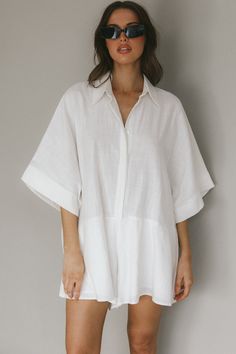 Shop the Daytona Beach Button-Up Romper White | Selfie Leslie White Tie Waist Jumpsuits And Rompers For Vacation, White Beach Jumpsuit With Tie Waist, White Tie Waist Jumpsuits And Rompers For Beach, White Tie Waist Jumpsuit For Beach, Summer Button-up Jumpsuit For Day Out, Short Sleeve Cotton Jumpsuits And Rompers For The Beach, Short Sleeve Jumpsuits And Rompers With Pockets For Beach, Summer Jumpsuits And Rompers With Short Sleeves Relaxed Fit, Cotton Short Sleeve Jumpsuits And Rompers For Beach