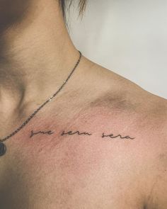 a woman's chest with the words, i am not here written on it