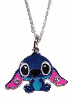 a blue and pink necklace with a small cartoon character on it's back end