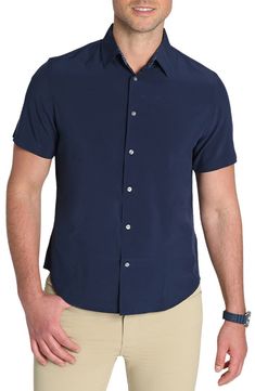 A crisp construction offers easy comfort to this short-sleeve button-up shirt that's great for work or play. Front button closure Spread collar Short sleeves 91% polyester, 9% spandex Machine wash, dry flat Imported Hairstyling Products, Exfoliate Face, Short Sleeve Button Up, Men's Grooming, Gravity, Boy's Clothing, Casual Button Down Shirts, Womens Swim, Nordstrom Rack