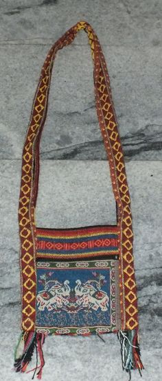 This handmade cotton shoulder bag with two zipped pockets originates from Thailand. The hanging length of the bag (line inclusive bag) is 71 cm. The bag is 20 cm by square. Its weight is 107 gram. (e9) SHIPPING SHIPMENT is FREE. All items are shipped within two working days after receipt of payment. We send everything by registered airmail. Insured packets (over 50 cm length / over 1500 gram) I send by standard way. PAYMENT Paypal is preferred. RETURN POLICY: NO RISK: Any item may be sent back w Multicolor Cotton Shoulder Bag With Zipper Pocket, Handmade Cotton Crossbody Shoulder Bag, Rectangular Woven Cotton Shoulder Bag, Rectangular Cotton Shoulder Bag For Market, Multicolor Handwoven Cotton Shoulder Bag, Standing Buddha Statue, Standing Buddha, Structure Design, 20 Cm