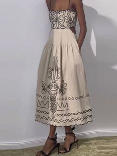 Dresses are a perfect garment to achieve a casual and fashionable look. In their different styles they will make you look radiant. But if what you want is to wear a casual outfit, this delicate and beautiful beige dress will be perfect. Casual style. Boho chic look. Sleeveless. Adjustable straps Polyester. Square neckline. Embroidered black details. Color may be lighter or darker depending of the device it is displayed. Vestidos Boho, Sleeveless Outfit, Sling Dress, Beige Dresses, Womens Robes, Hip Dress, Beachwear For Women, Women Long Dresses, Flowing Maxi Dress