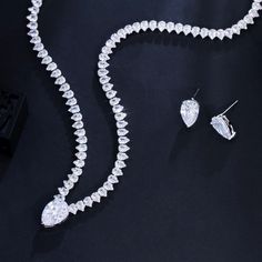 ⭐️ Material: AAA Cubic Zirconia ⭐️ Water Drop Shape ⭐️ Earring Length: 1.2cm ⭐️ Necklace Length: 42cm + 1.5cm White Gold Crystal Bridal Necklace For Party, Diamond Cut Cubic Zirconia Jewelry Sets For Party, Cubic Zirconia Bridal Necklace For Party, White Gold Teardrop Jewelry For Party, Round Cubic Zirconia Bridal Necklace For Party, Silver Teardrop Bridal Necklace For Party, Pear-shaped Crystal Jewelry For Formal Occasions, Pear-shaped Crystal Jewelry For Formal Events, Pear-shaped Diamond Cut Jewelry For Party