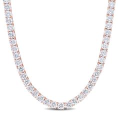 Feel like a princess in this classic Cubic Zirconia Tennis Necklace. Mounted in luminous rose plated sterling silver, it features 103 round-cut, sparkling cubic zirconia gemstones (4 x 4mm) embellished in a tennis motif for an elegant and bold look. Enhanced with a high polish finish, this CZ tennis necklace is 17-inches long and fastens with a pressure tongue clasp. This gorgeous gemstone tennis necklace is an ideal choice for today's contemporary woman. Rose Gold Brilliant Cut Tennis Necklace For Anniversary, Anniversary Rose Gold Brilliant Cut Tennis Necklace, Formal Rose Gold Diamond Tennis Necklace, Rose Gold Diamond Tennis Necklace For Formal Occasions, Iced Out Rose Gold Necklace For Formal Occasions, Rose Gold Diamond Iced Out Necklace, Rose Gold Tennis Necklace With Diamond Accents, Iced Out Rose Gold Diamond Necklace, Classic Rose Gold Tennis Necklace