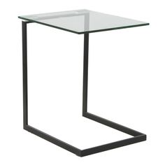 a glass and metal side table on a white background