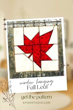 a card with a red star on it and the words, window hanging fall leaf