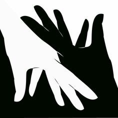 two hands reaching towards each other with one hand holding the other's arm in black and white