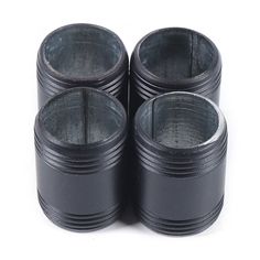 four black plastic cups sitting on top of each other