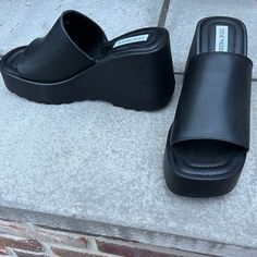 Never Worn Size 9.5! Originally $100!! Black Synthetic Heels For Streetwear, Black Synthetic Heels With Rubber Sole, Black Casual Streetwear Heels, Casual Black Heels For Streetwear, Casual Leather Heels For Streetwear, Closed Toe Leather Heels For Streetwear, Leather Closed Toe Heels For Streetwear, Casual Black Synthetic Heels, Leather Sandals With Textured Sole For Streetwear