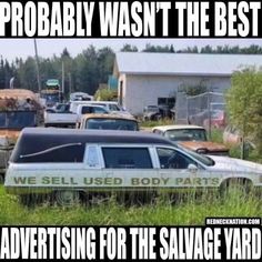 an advertisement for the salvage yard is shown in front of many old cars and trucks