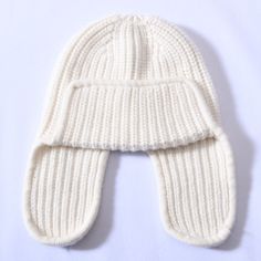 For fashion enthusiasts out there, this beanie is a must-have. Its comfort factor, complete with earflaps, makes it a preferred choice among people. Women particularly love this comfortable beanie for its warmth and coziness. Crafted from high-quality cashmere and wool, it offers both comfort and style. Don't miss out on this trendy beanie!SpecificationsStyle: CasualPlace Of Origin: China (Mainland)Pattern Type: SolidOrigin: Mainland ChinaModel Number: JX-016Material: WoolItem Type: Skullies & BeaniesGender: WOMENFeature: Keep warmDepartment Name: AdultCN: ZhejiangBrand Name: GeraldBlackApplicable Season: WinterApplicable Scene: Casual ShippingThis product ships from China in 3 to 5 days. You should receive this product within 12 to 21 business days. Our standard shipping is free to most c Cashmere Beanie, Warm Winter Hats, People Women, Skull Design, Winter Hat, Winter Looks, Beanie Hat, Stylish Accessories, Beanie Hats