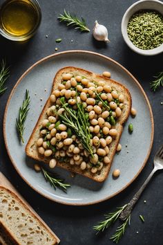 A photo of a  Garlic and Herb Beans on Toast which is a type of Beans on toast ideas Simple Sandwiches