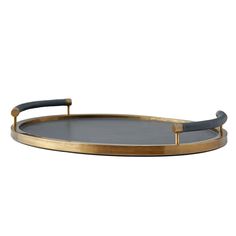 an oval tray with two handles on it