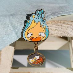 Howl's Moving Castle Calcifer Bacon Enamel Pin – FloralFrolicFoxes Howl's Moving Castle Calcifer, Bacon Eggs, Art Outfit, Enamel Pin Collection, Howl's Moving Castle, Bag Pins, School Accessories, Cool Pins, Howls Moving Castle