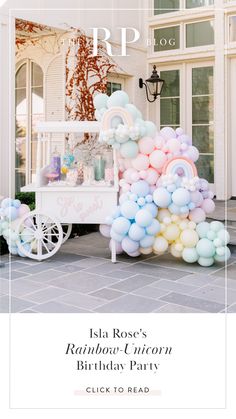 a birthday party with balloons and a cart