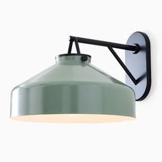 a green wall light with a black arm and a white shade on it's side