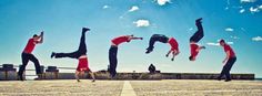 a group of people doing tricks in the air