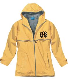 Ladies, stay dry with this monogrammed full zip rain jacket from Charles River Apparel! Also available in matching Toddler, Children's and Youth sizes! Wind & waterproof New Englander® Polyurethane bonded to a woven backing to provide additional fabric strength. Lined with grey mesh for air-flow circulation and taffeta nylon in sleeves for easy on/off. Hood & open hem with shock cord drawstrings. Wind flap & heat-sealed seams throughout to seal out wind & rain. Front vented capes Monogrammed Rain Jacket, Yellow Rain Jacket, Bday List, Black Rain Jacket, Vinyl Raincoat, Toddler Jacket, Charles River, Waterproof Rain Jacket, Yellow Raincoat