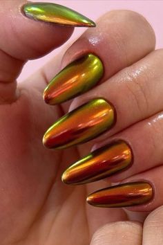 Looking to add some fun and vibrant colors to your nail game? Check out these stunning 32 chrome nail designs! From mesmerizing art to shiny finishes, these trendy styles are sure to make a statement. #nailinspiration #chromenails #nailart Crazy Chrome Nails, Chrome Nails Using Eyeshadow, Molten Metal Chrome Nails