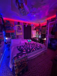 a bed room with a neatly made bed and colorful lights