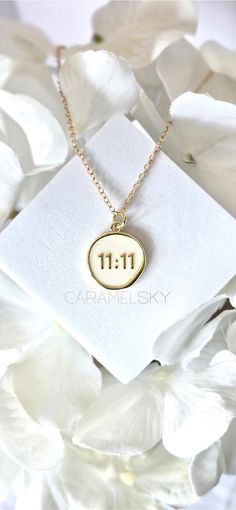 11:11 is rooted in numerology and can have spiritual meaning.  Seen as an angel sign, 11:11 is associated with new beginnings.   This beautiful necklace has an 18K Gold-Filled 11:11 pendant with white enamel.  Set on a 16" adjustable length gold necklace.  It's a simply beautiful necklace for everyday wear.   11:11 Pendant is 100% lead and nickel free, hypoallergenic, anti tarnish and waterproof. Necklace chain is a gold color metal with lobster clasp. Allergy Disclaimer: Some people are allergi Angel Number, 1111 Necklace, Beautiful Necklace, Waterproof Necklace, Jewelry Angel, Angel Number Necklace, Spiritual Necklace, Number Necklace, Spiritual Meaning